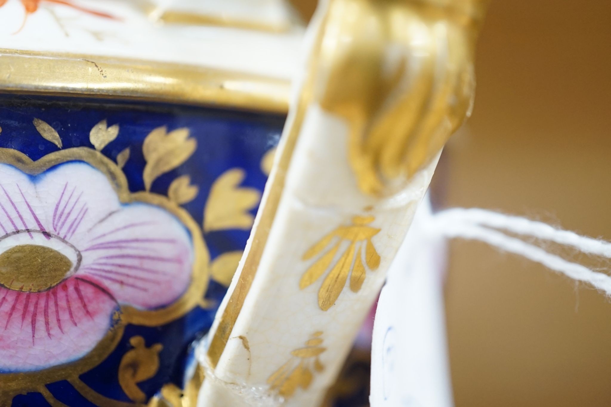 An early 19th century Derby garniture of Imari style vases 29cm